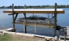 roof added to simple boathouse/lift